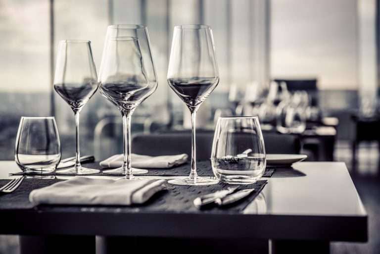 Empty Glasses in Restaurant cleaned with soft water from Indy Soft Water